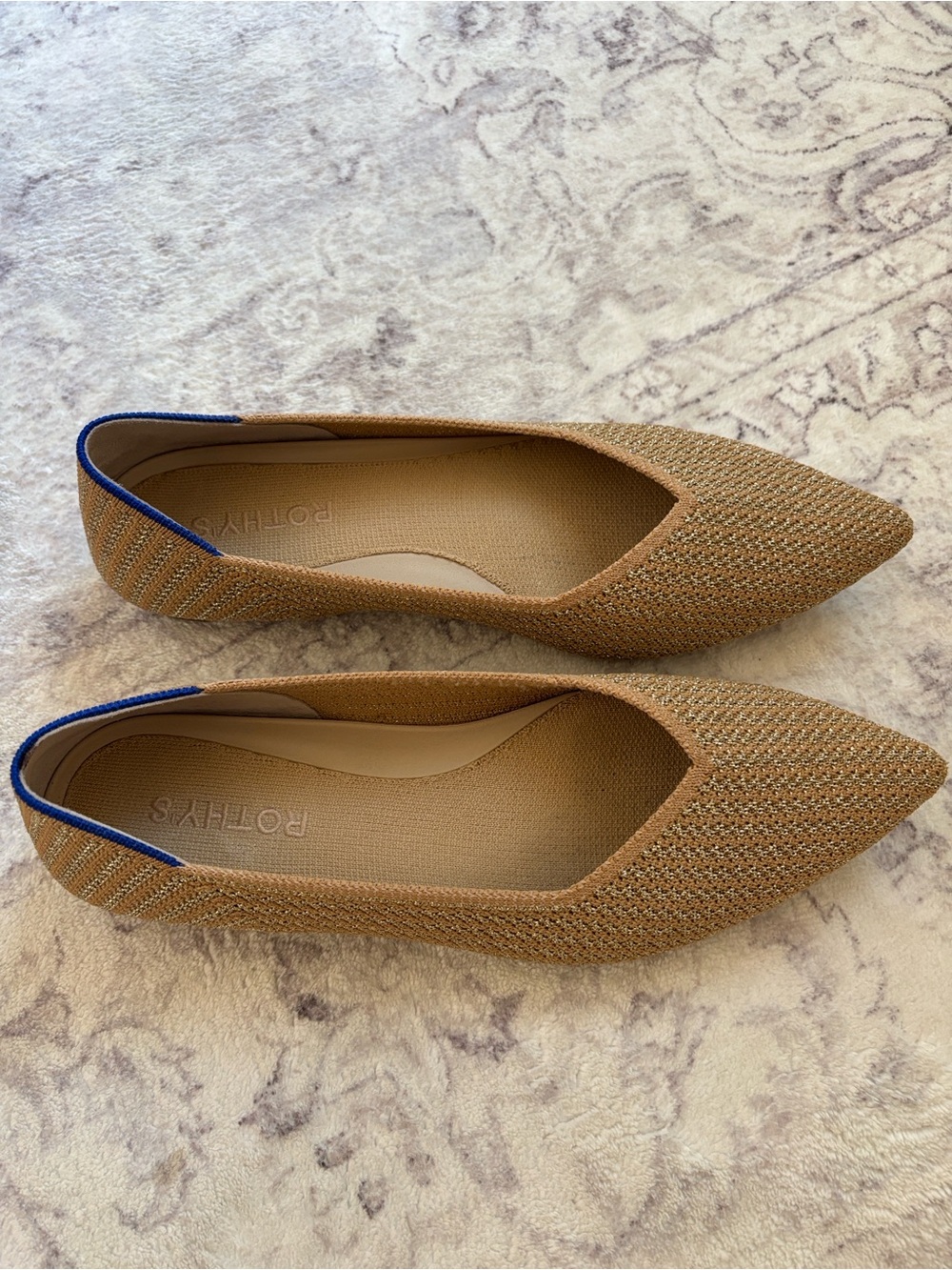 Rothy's Pointed Knit Flats in gold stripe with Blue Trim